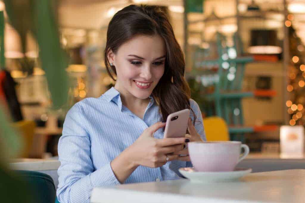 woman searching on mobile phone - user intent